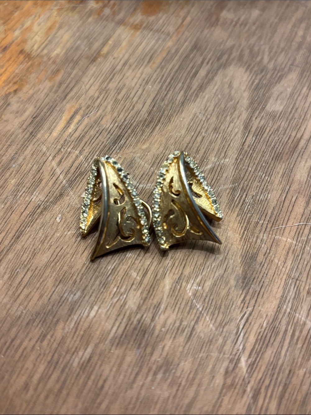 Vintage BSK Gold-Tone Filigree Clip Earrings with Rhinestone Accent